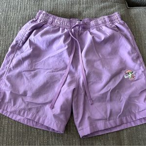 Nike Sportswear Sport Essentials
Men's Woven Lined Flow Shorts
Above the knee